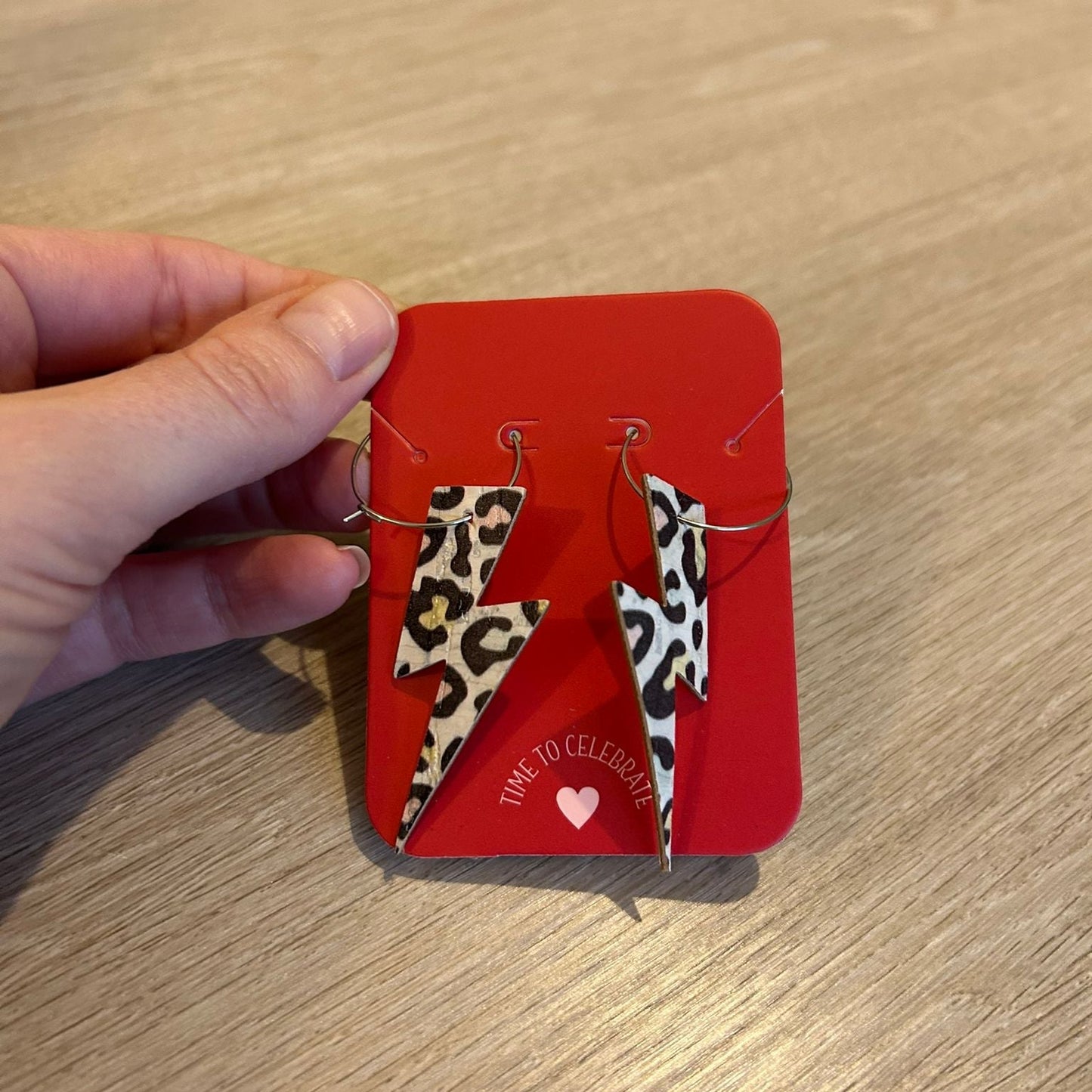 Double sided silver and rainbow leopard print cork lightning bolt earrings - Trend Tonic