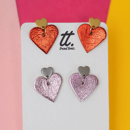 a group of heart shaped earrings