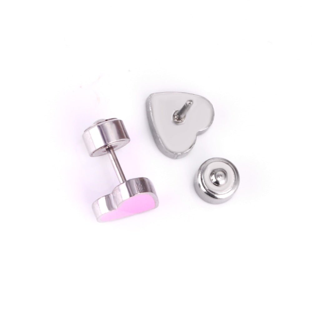 a pair of earrings with a pink heart