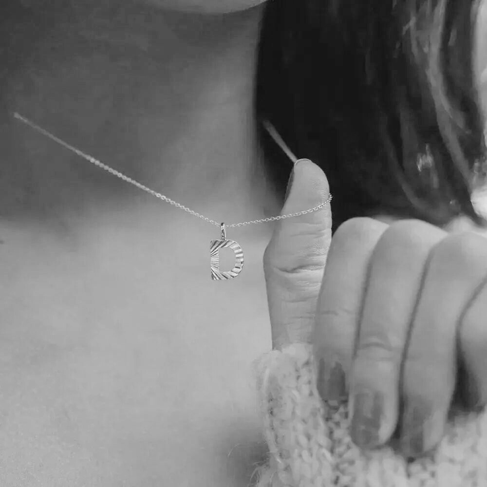 Silver sunbeam initial necklace