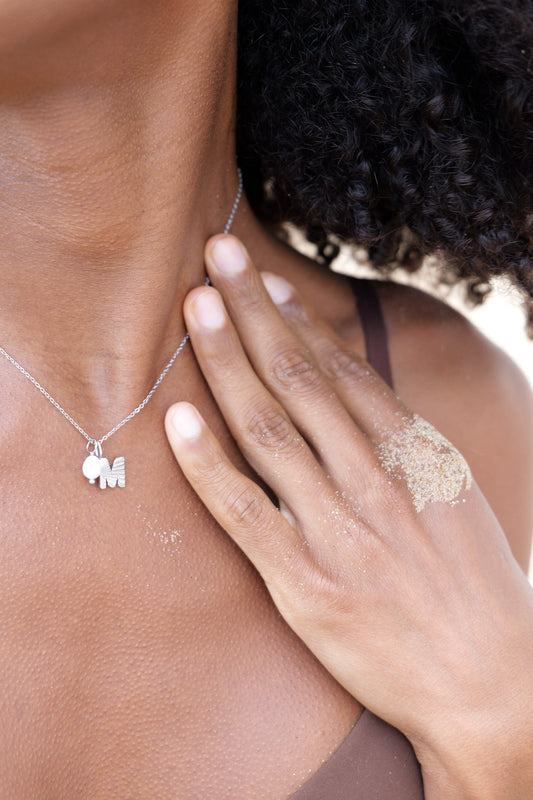 Silver sunbeam initial necklace