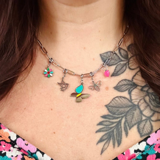 a woman with a tattoo on her neck