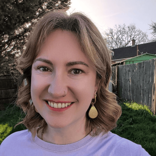 a woman smiling for a selfie