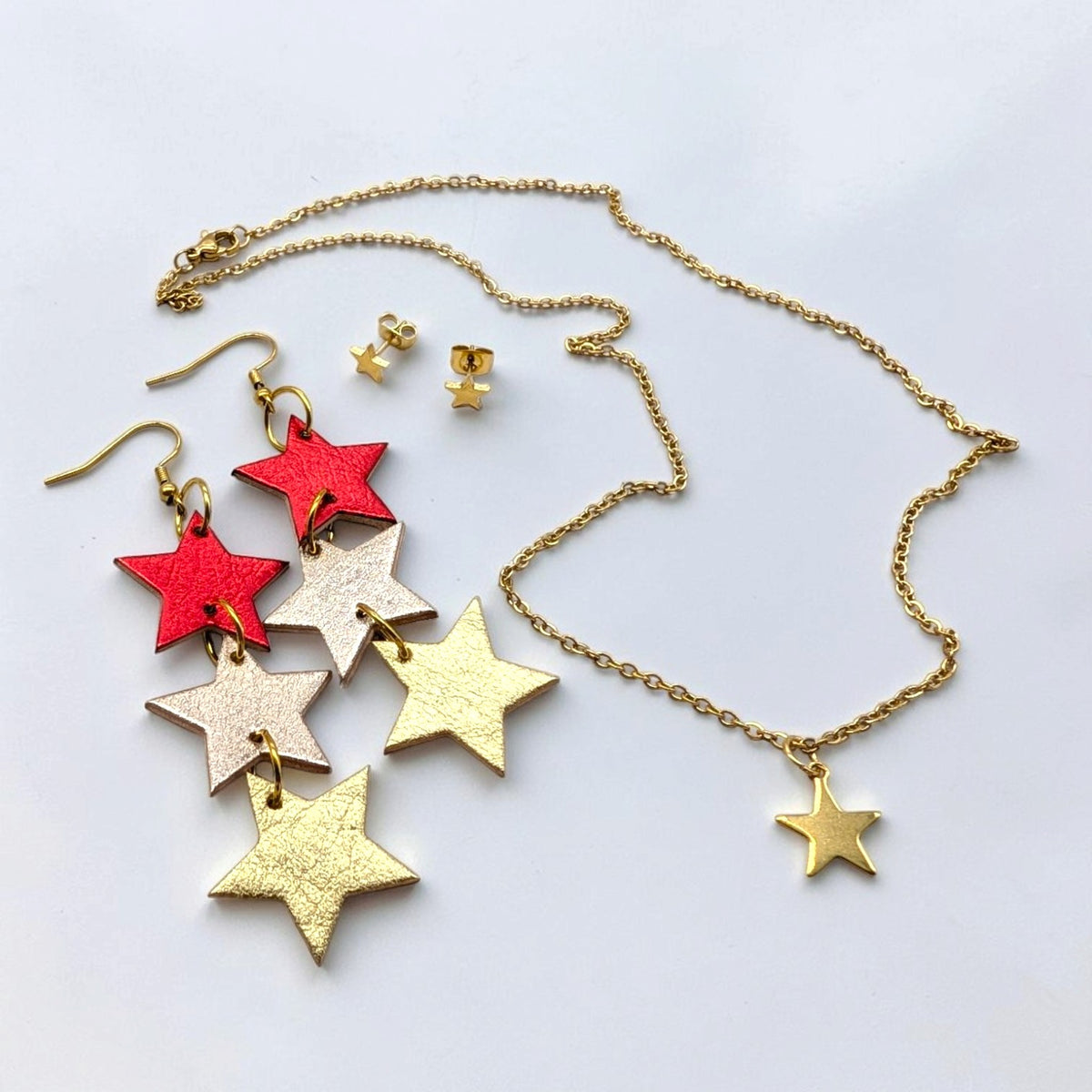 a necklace and earrings with stars