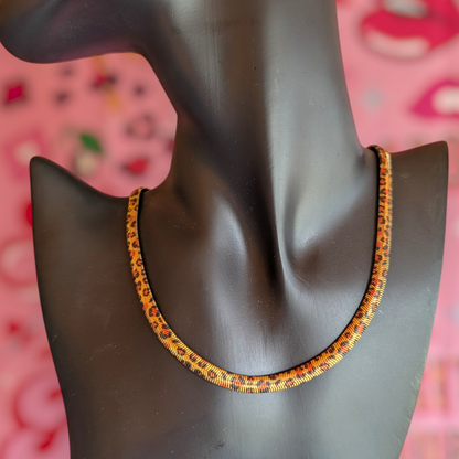 a necklace on a mannequin