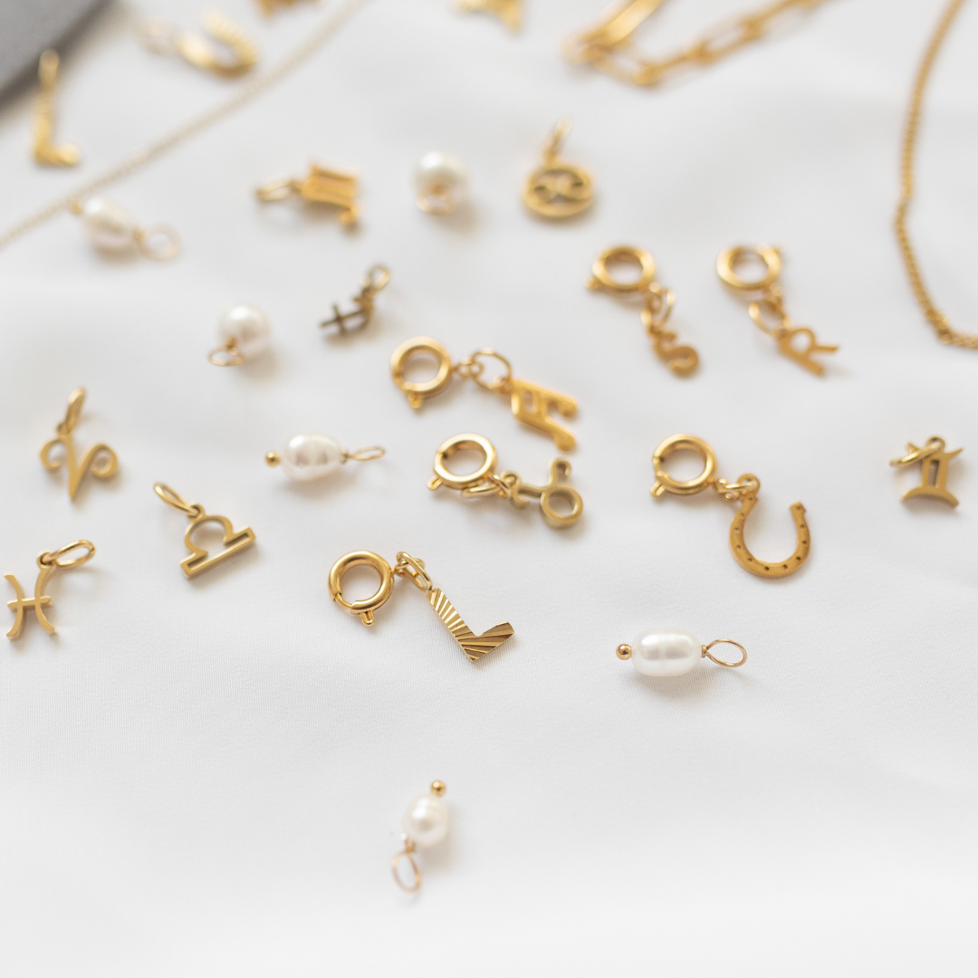 Gold sunbeam initial necklace