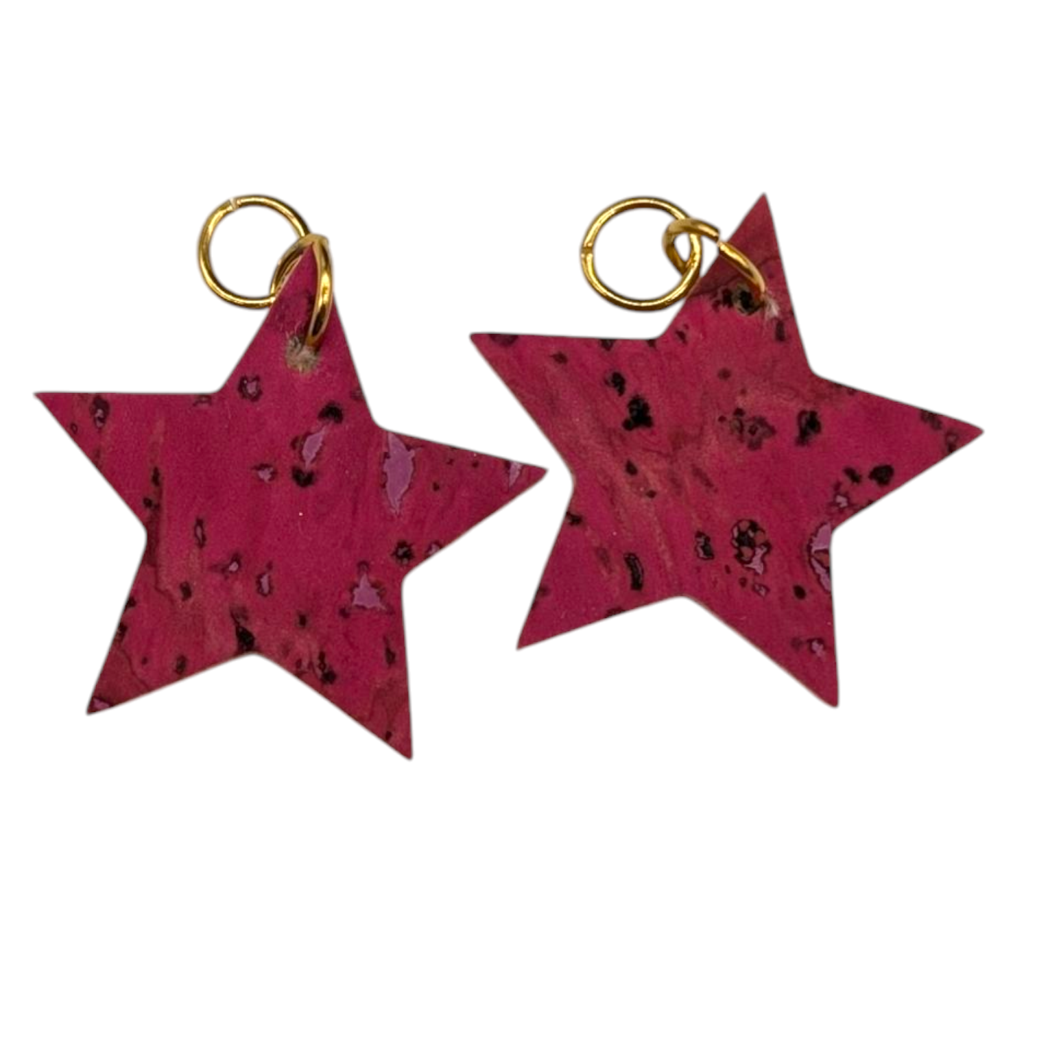 a pair of red star shaped earrings