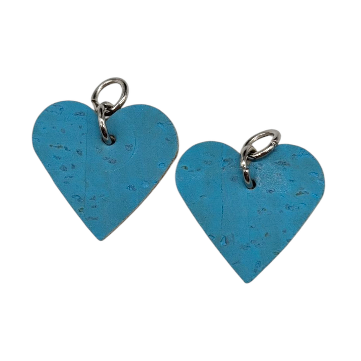 a pair of blue heart shaped tags