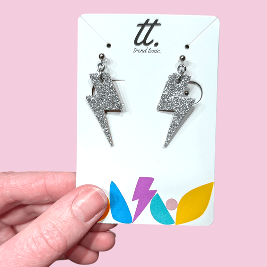 Clip on mini silver glitter cork lightning bolt earrings - Trend Tonic