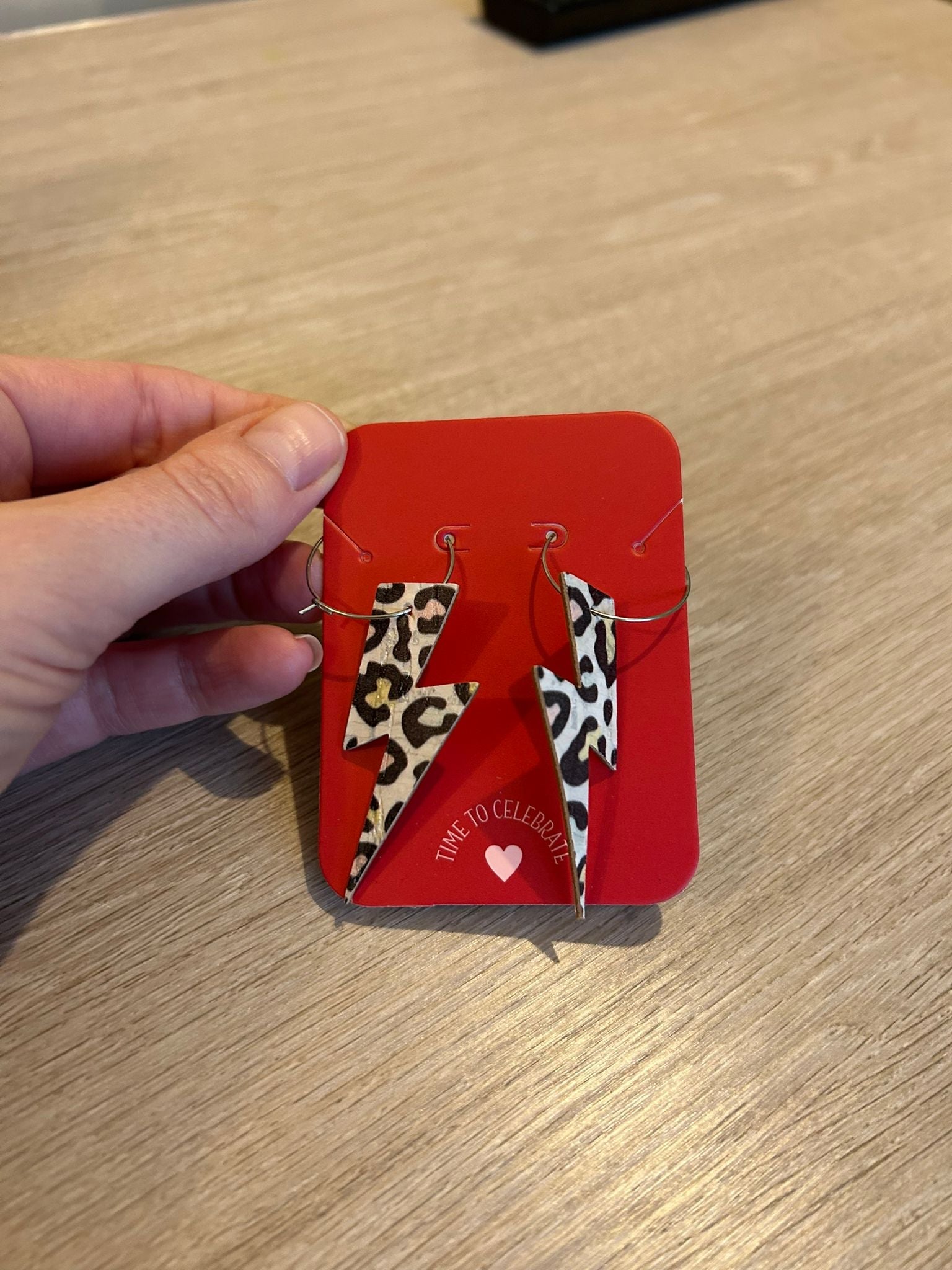 Double sided silver and rainbow leopard print cork lightning bolt earrings - Trend Tonic