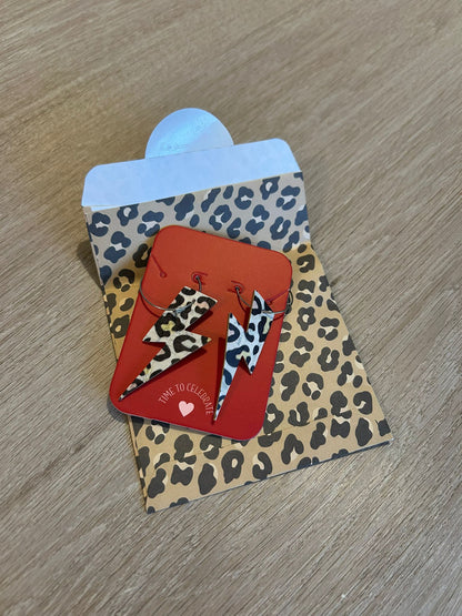 Double sided silver and rainbow leopard print cork lightning bolt earrings - Trend Tonic
