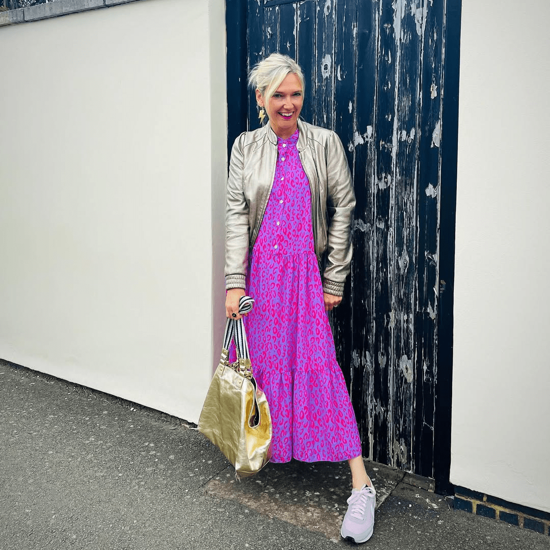 a woman in a pink dress