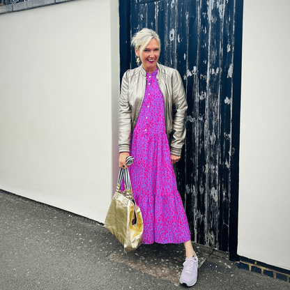 a woman in a pink dress