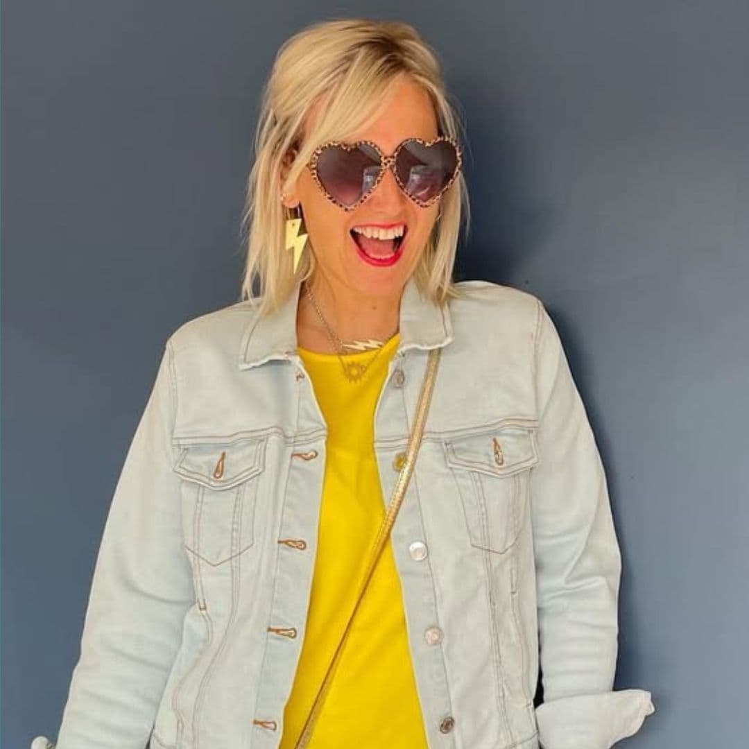 a woman wearing heart shaped sunglasses