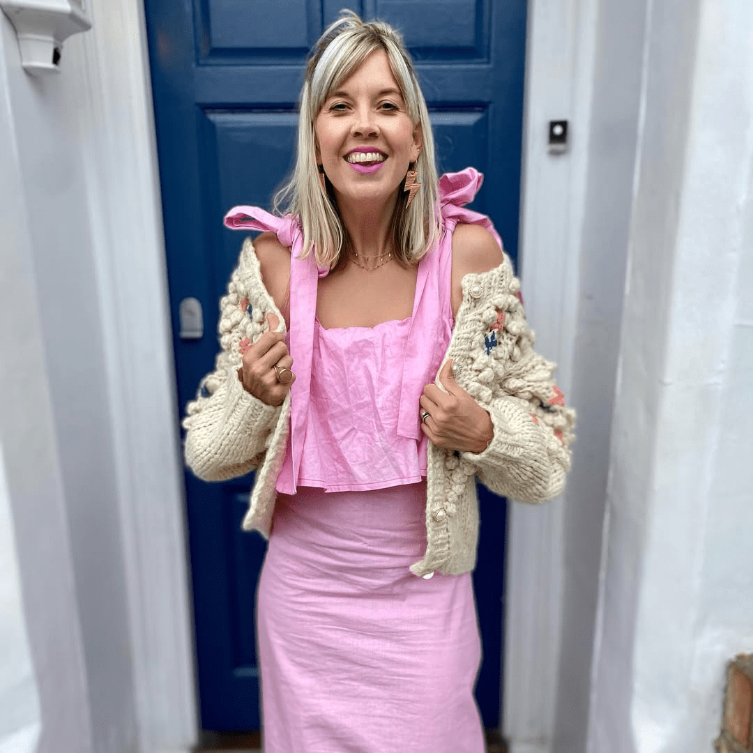 a woman in a pink dress