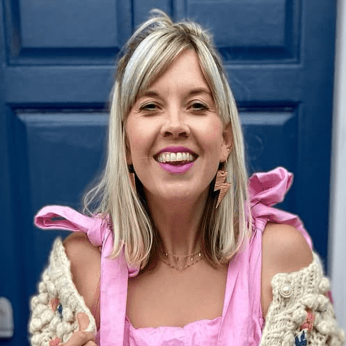 a woman in a pink dress