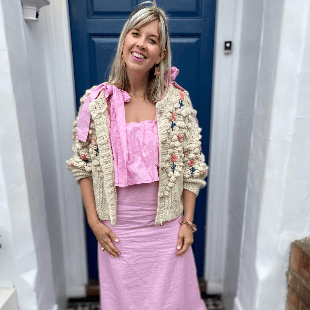 a woman in a pink dress
