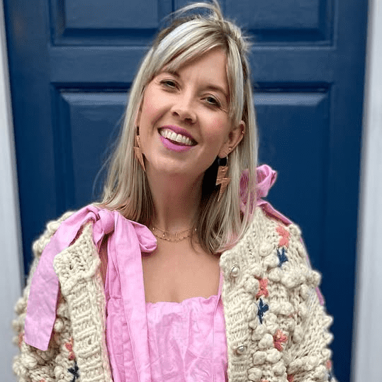 a woman in a pink dress