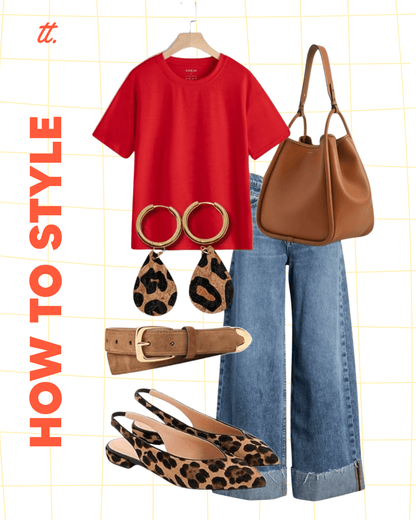 a red shirt and leopard print shoes