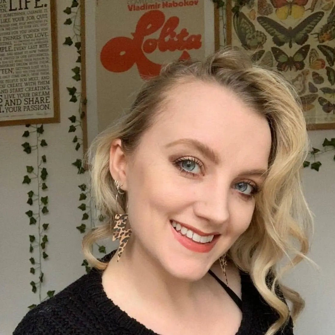 a woman smiling for a selfie