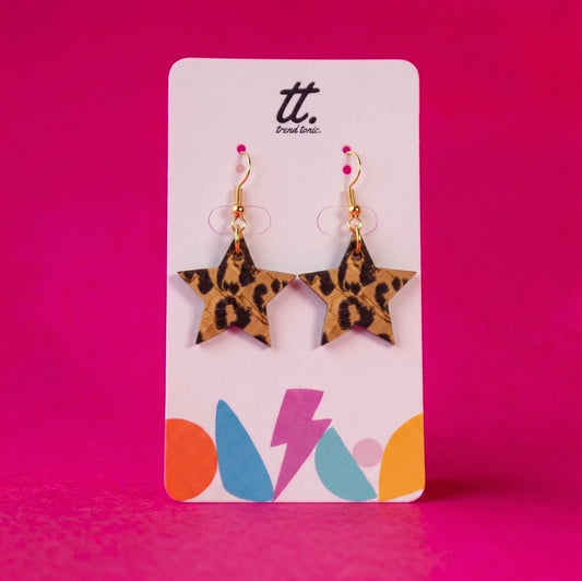 a pair of earrings on a card
