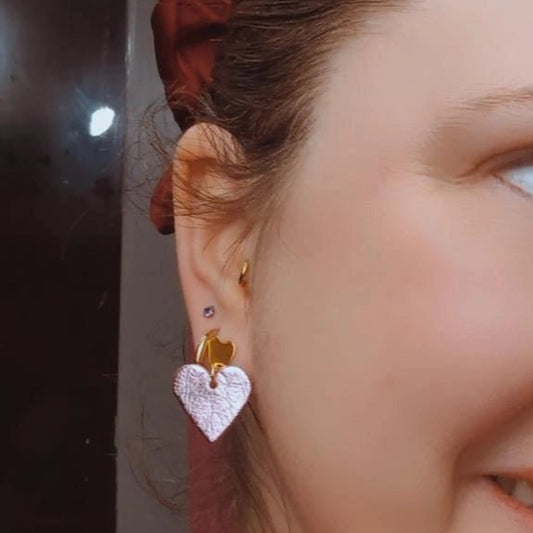 a close up of a woman's ear