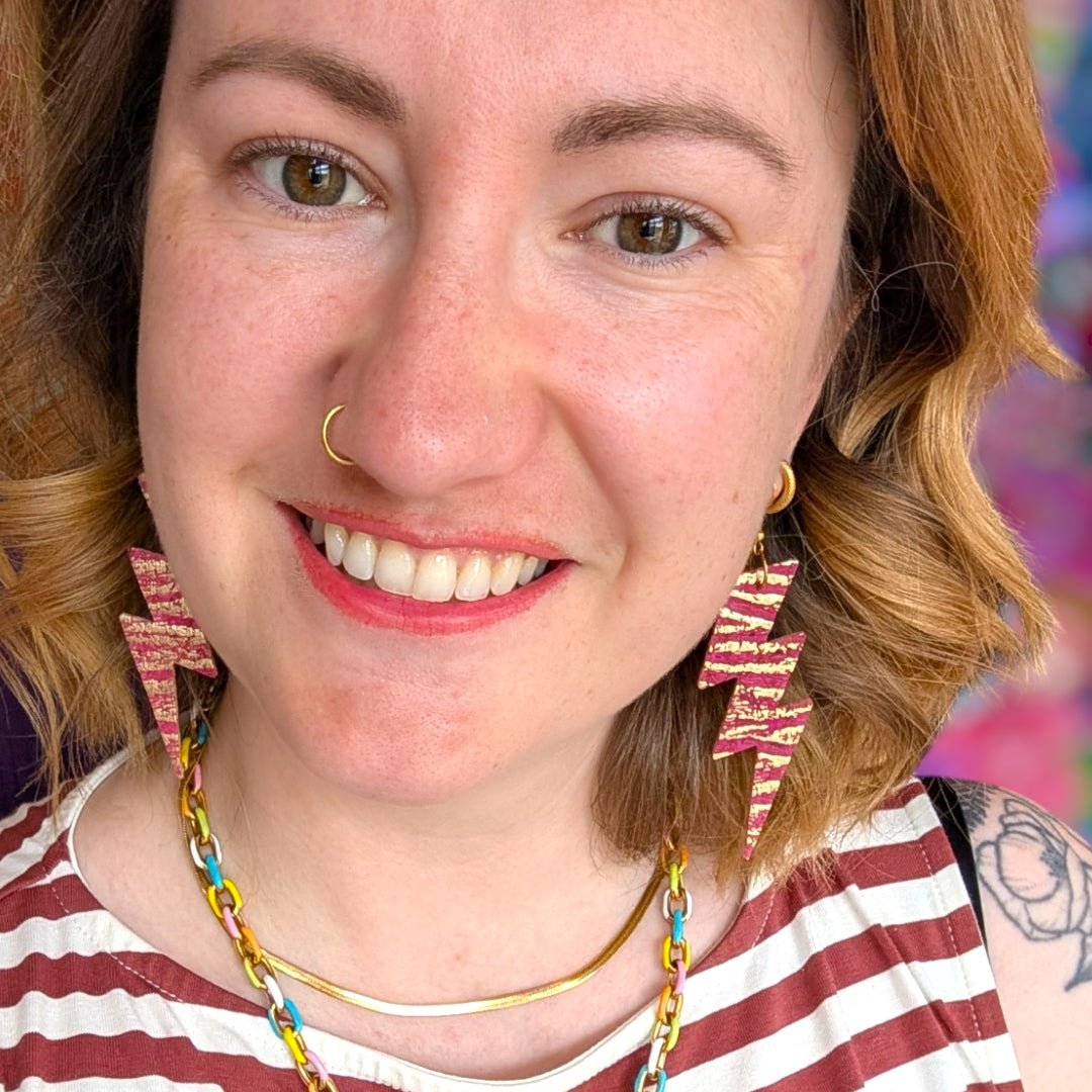 Metallic zebra print triple lightning bolt cork leather earrings - Trend Tonic