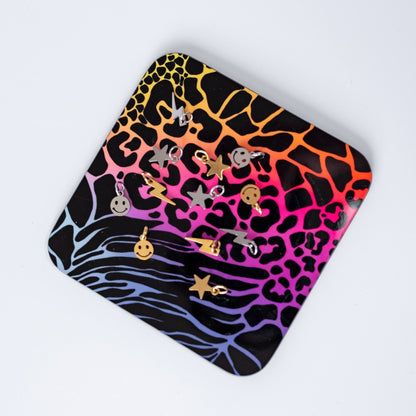 a colorful square with many earrings