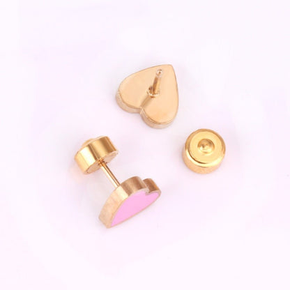 a pair of gold earrings