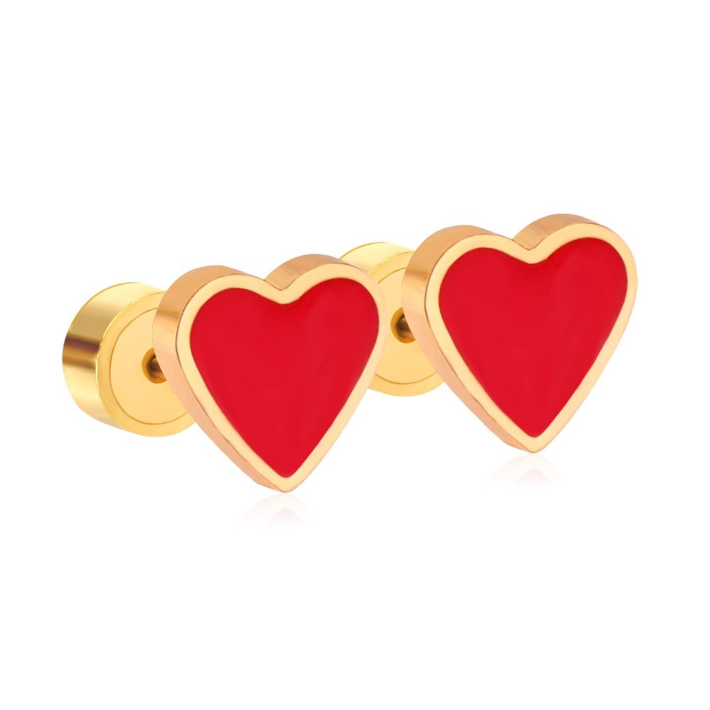 a pair of heart shaped earrings