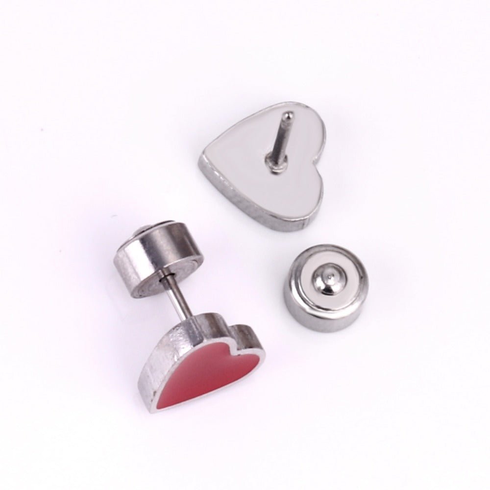 a pair of heart shaped earrings