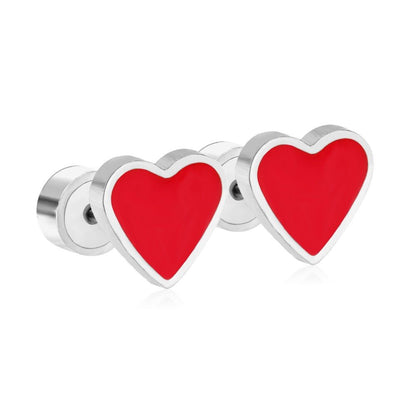 a pair of red heart shaped earrings