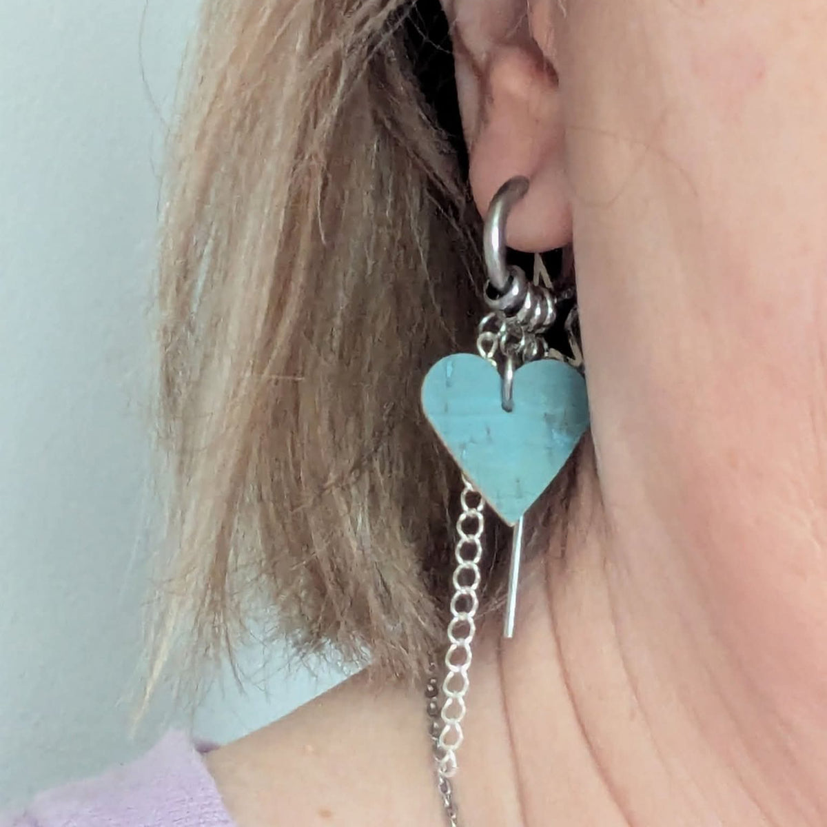 a close up of a woman's ear