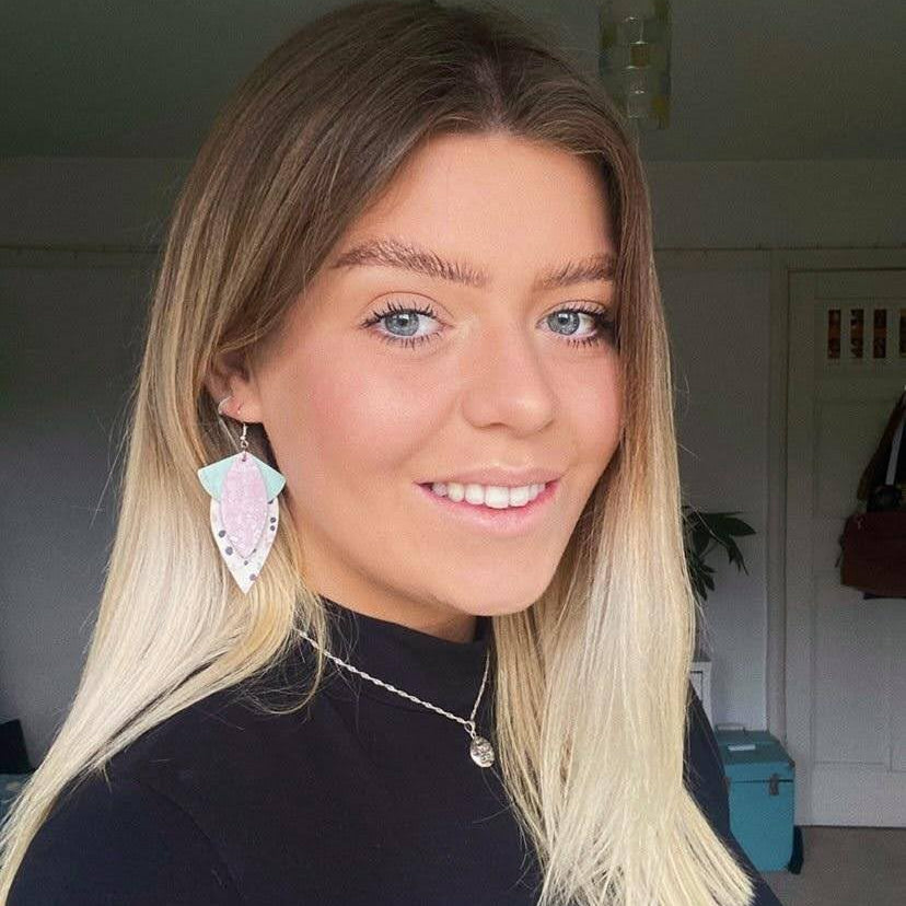 a woman smiling for a selfie