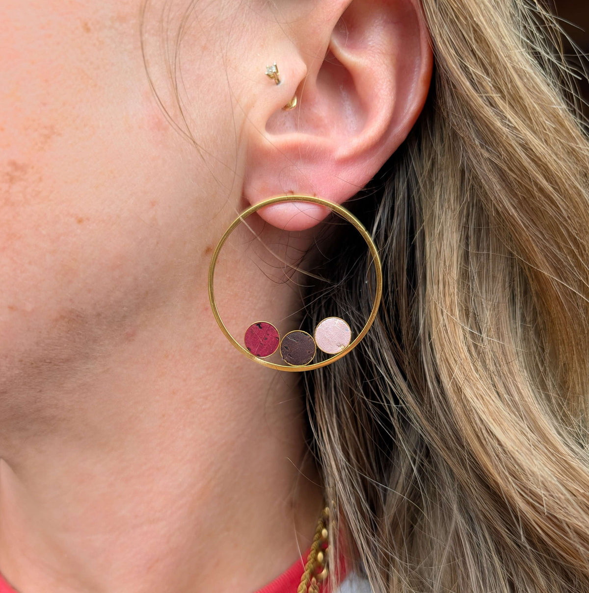 a close up of a woman's ear