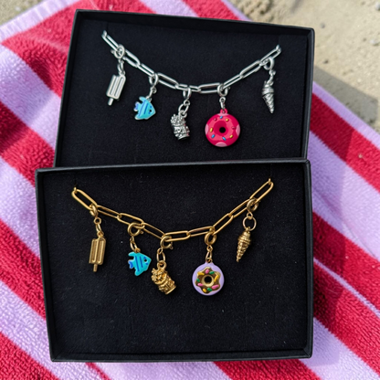 a bracelets in a box on a towel