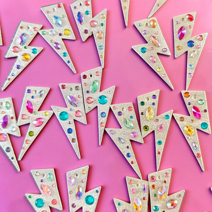 a group of lightning bolts with colorful gems