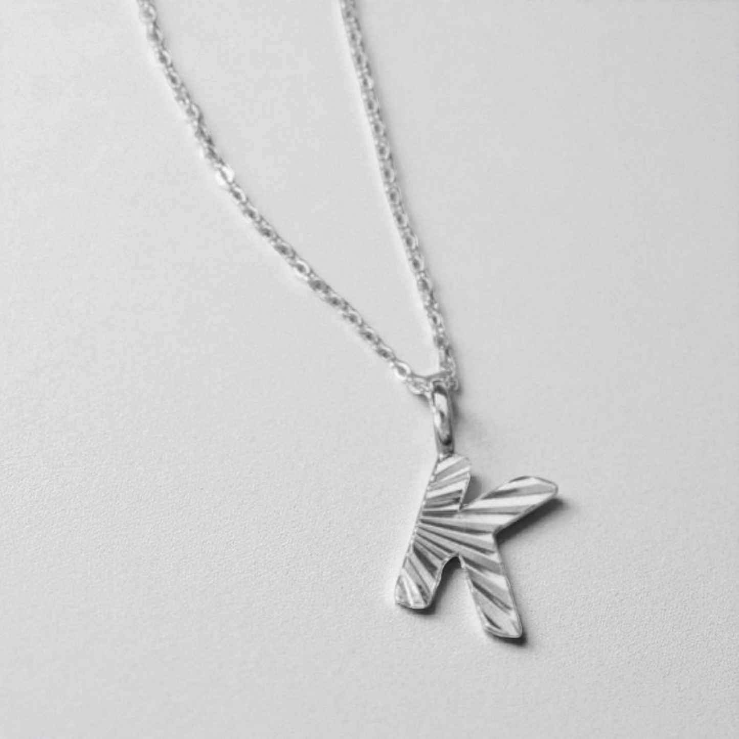 Silver sunbeam initial necklace