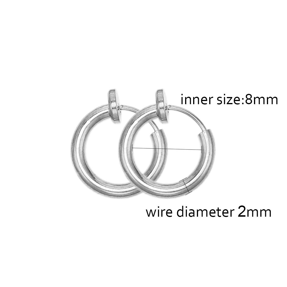 a pair of silver hoop earrings