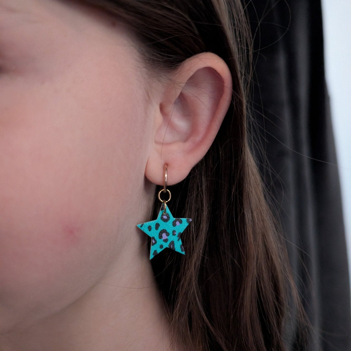 a close up of a woman's ear