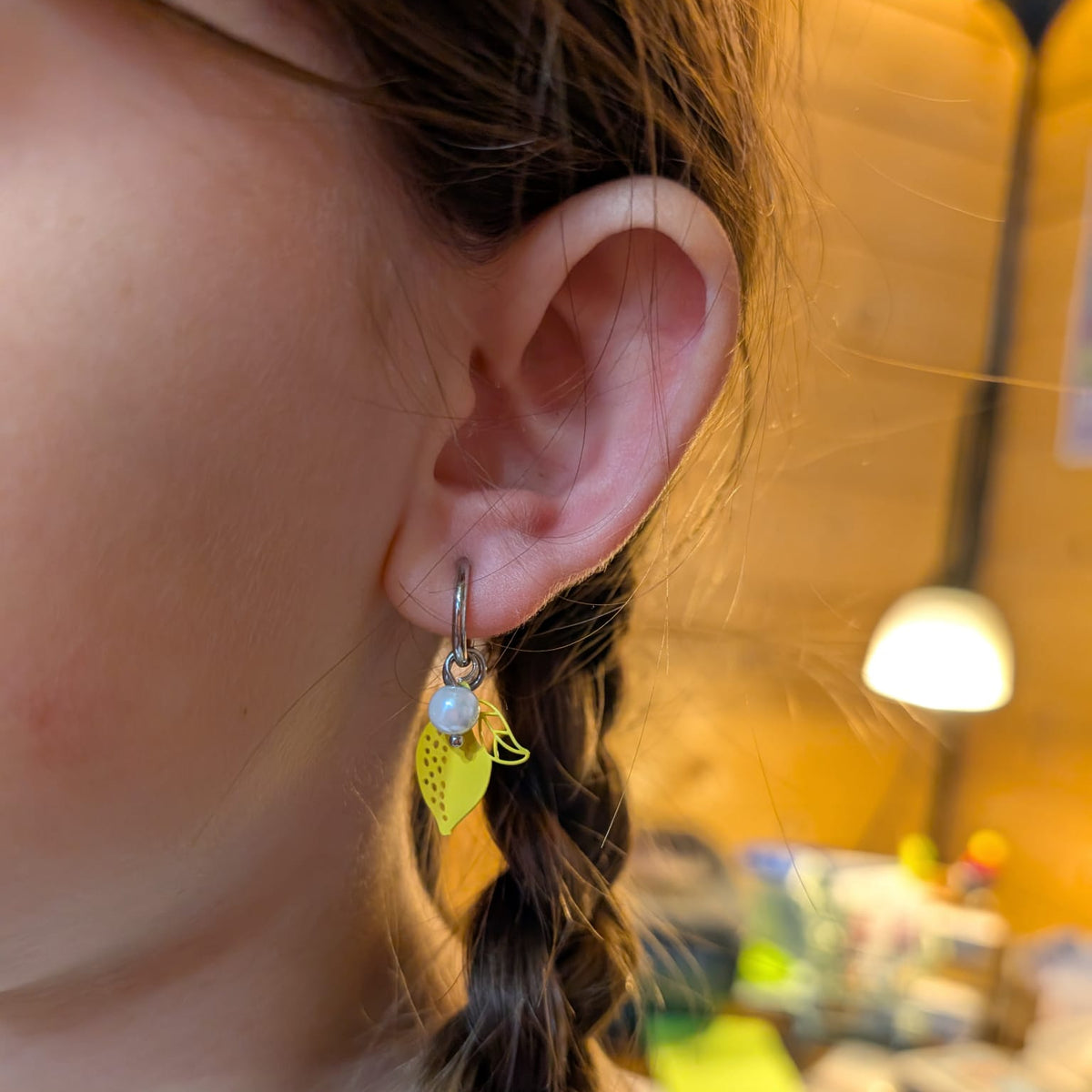 a close up of a woman's ear