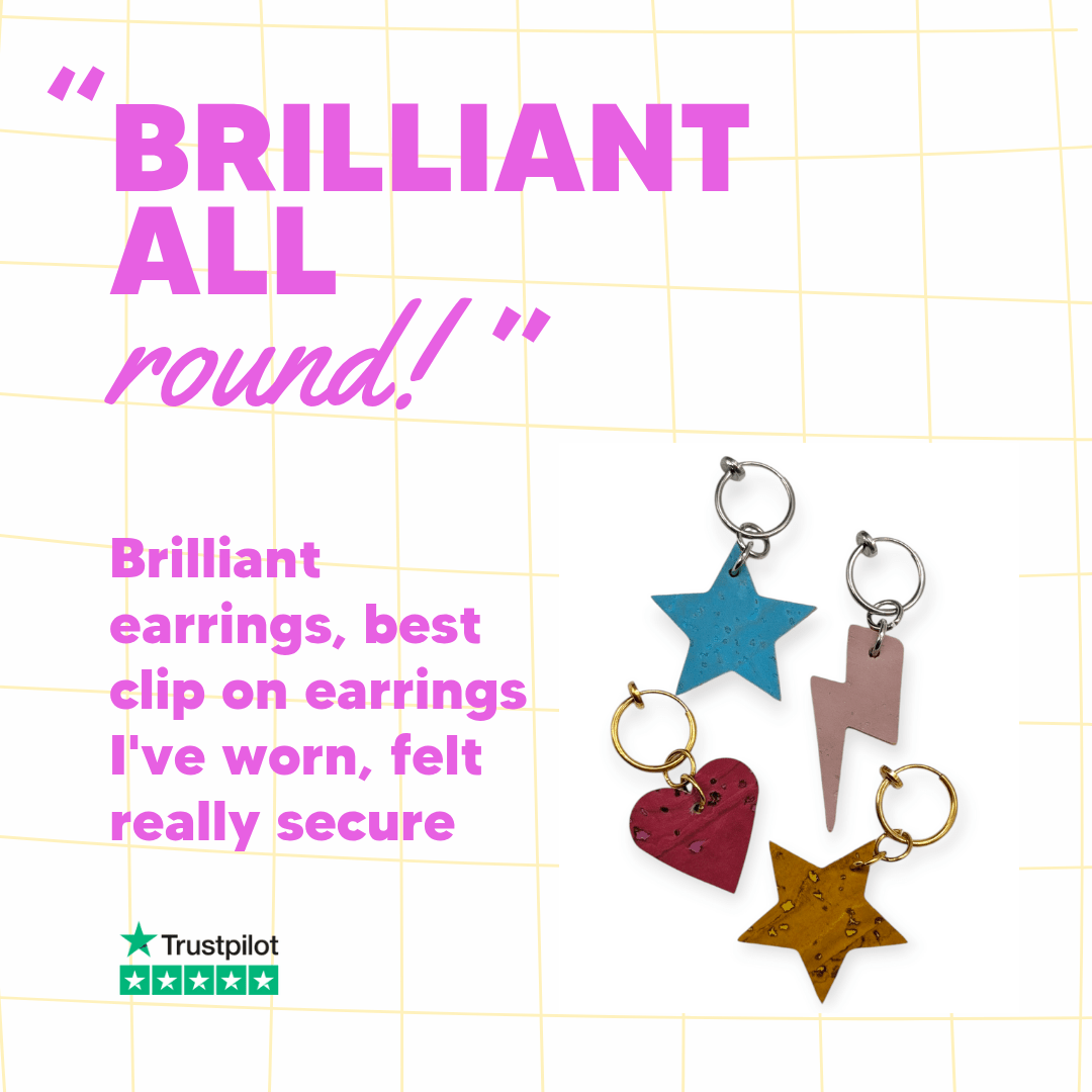 a group of earrings on a grid