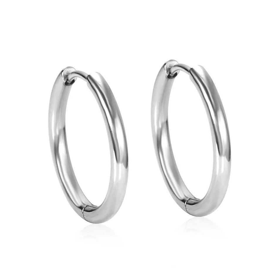 a pair of silver hoop earrings