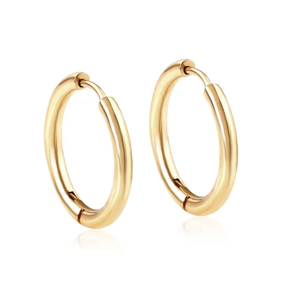 a pair of gold hoop earrings